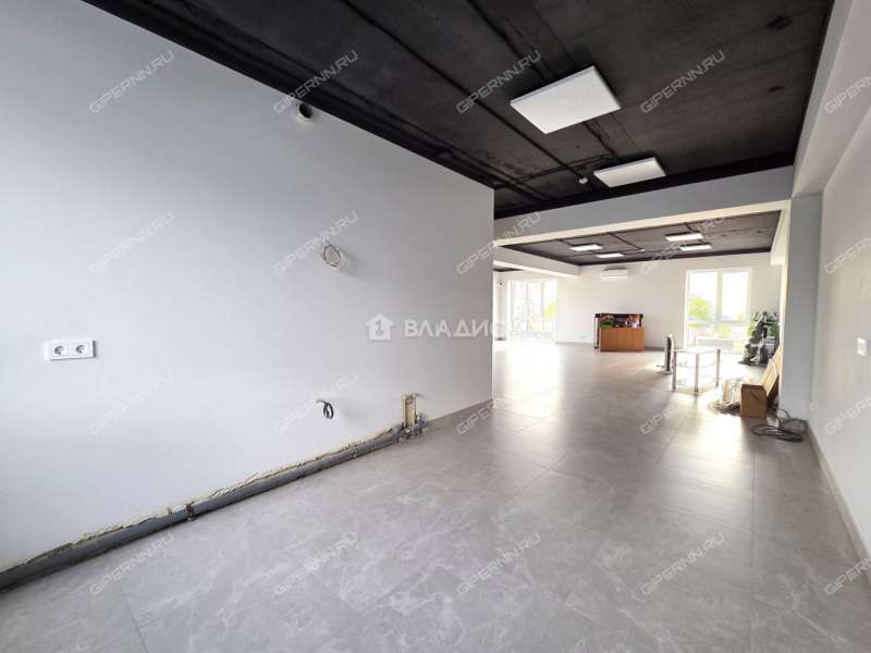 здание под офис, торговую площадь на улице Ларина